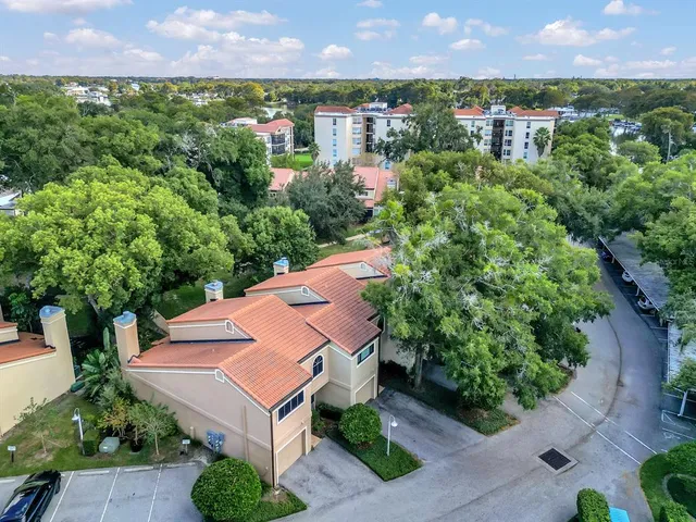 an aerial view of a house with a garden