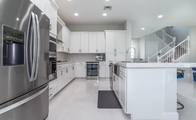 a bathroom with a double vanity sink and a mirror