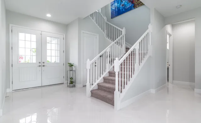 a bathroom with a sink and mirror
