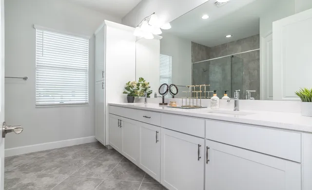 a bedroom with a bed and a table