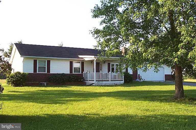114 Hoofprint Drive Bunker Hill, WV 25413 - Photo 1 of 13 a view of a house with a swimming pool
