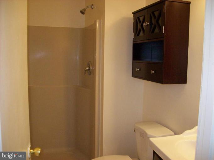 114 Hoofprint Drive Bunker Hill, WV 25413 - Photo 13 of 13 a bathroom with a sink and a toilet