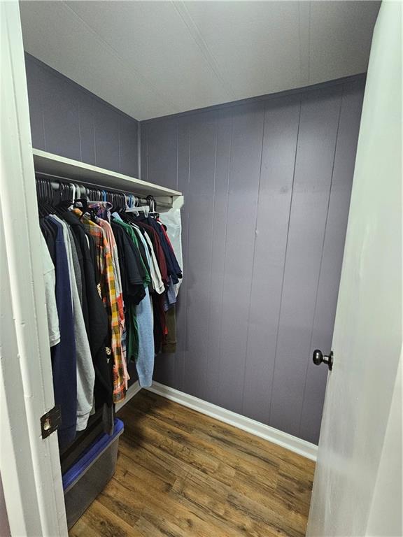 33 Cedar Lane Northwest Rome, GA 30165 - Photo 13 of 22 a view of walk in closet with clothes and shoes