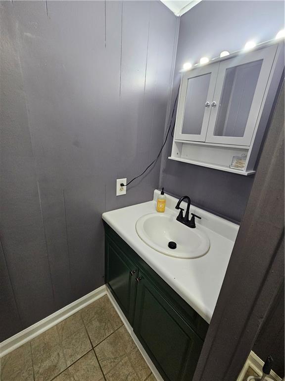 33 Cedar Lane Northwest Rome, GA 30165 - Photo 18 of 22 a bathroom with a sink and a mirror
