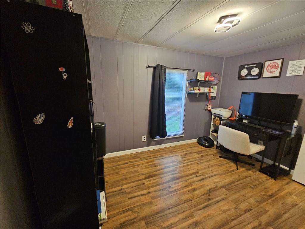 33 Cedar Lane Northwest Rome, GA 30165 - Photo 19 of 22 a bedroom with a bed and furniture