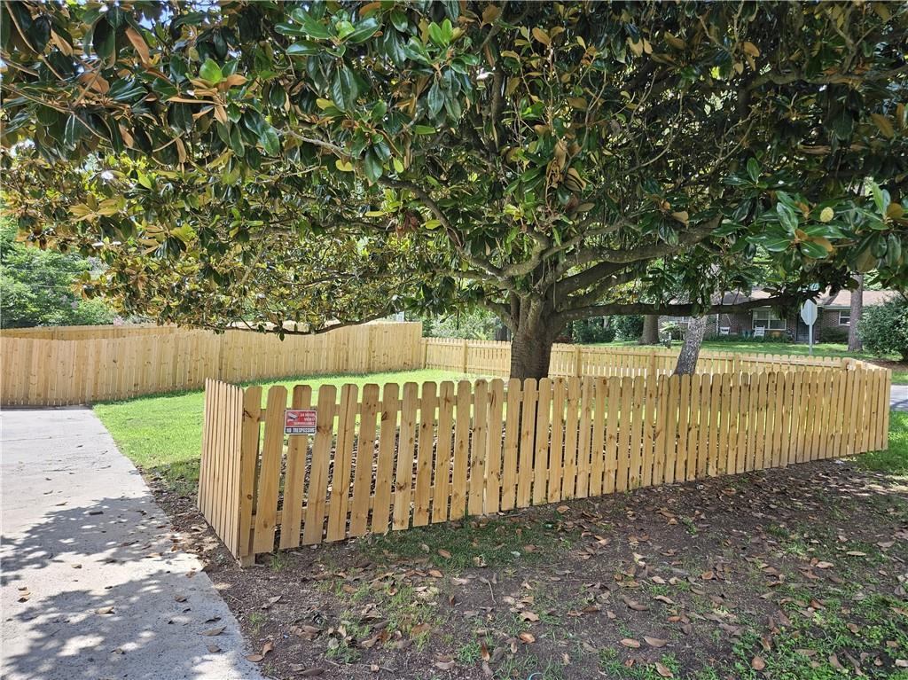 33 Cedar Lane Northwest Rome, GA 30165 - Photo 6 of 22 a view of a street with fence