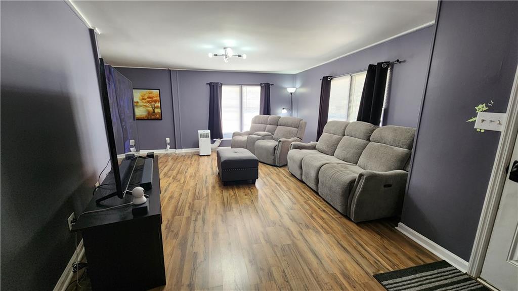 33 Cedar Lane Northwest Rome, GA 30165 - Photo 7 of 22 a living room with furniture and wooden floor