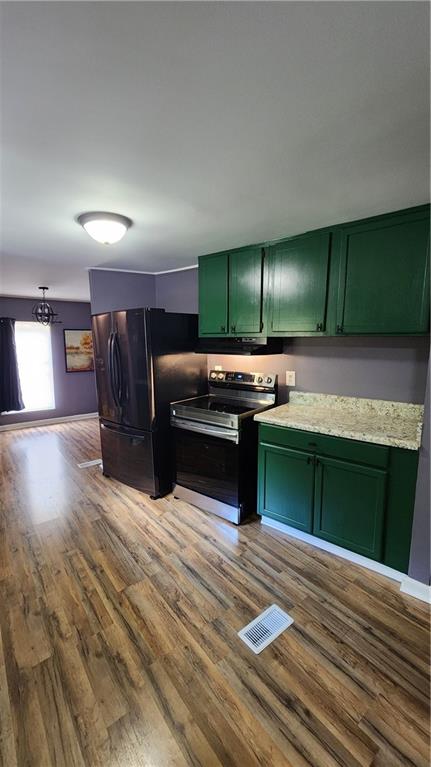 33 Cedar Lane Northwest Rome, GA 30165 - Photo 9 of 22 a kitchen with a refrigerator and a sink