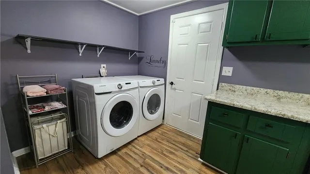 a utility room with dryer and washer