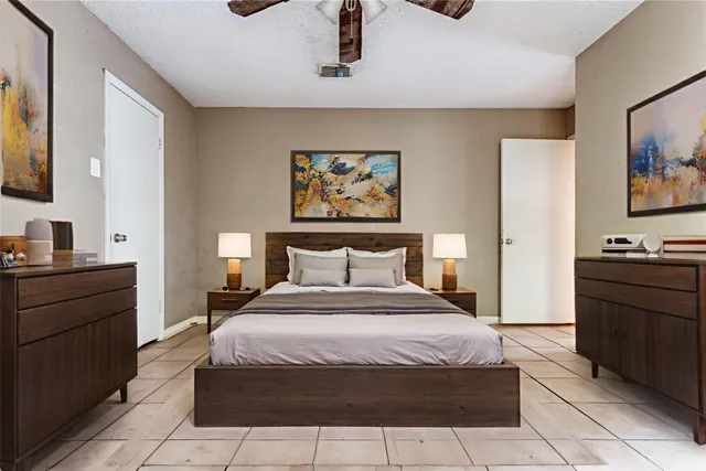 a bedroom with a bed and a furniture