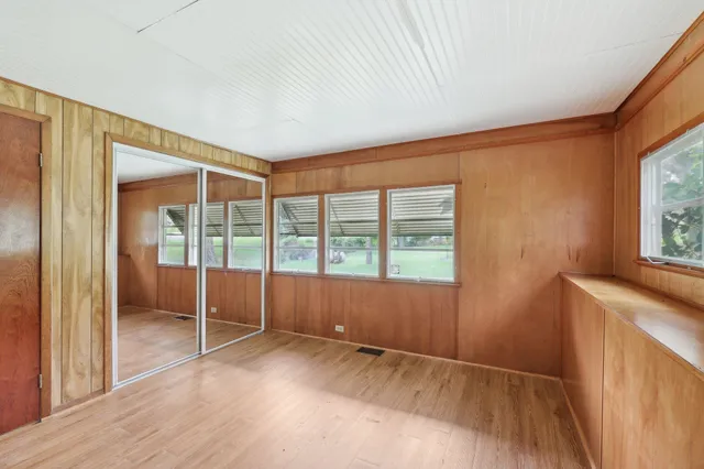 a view of an empty room and window