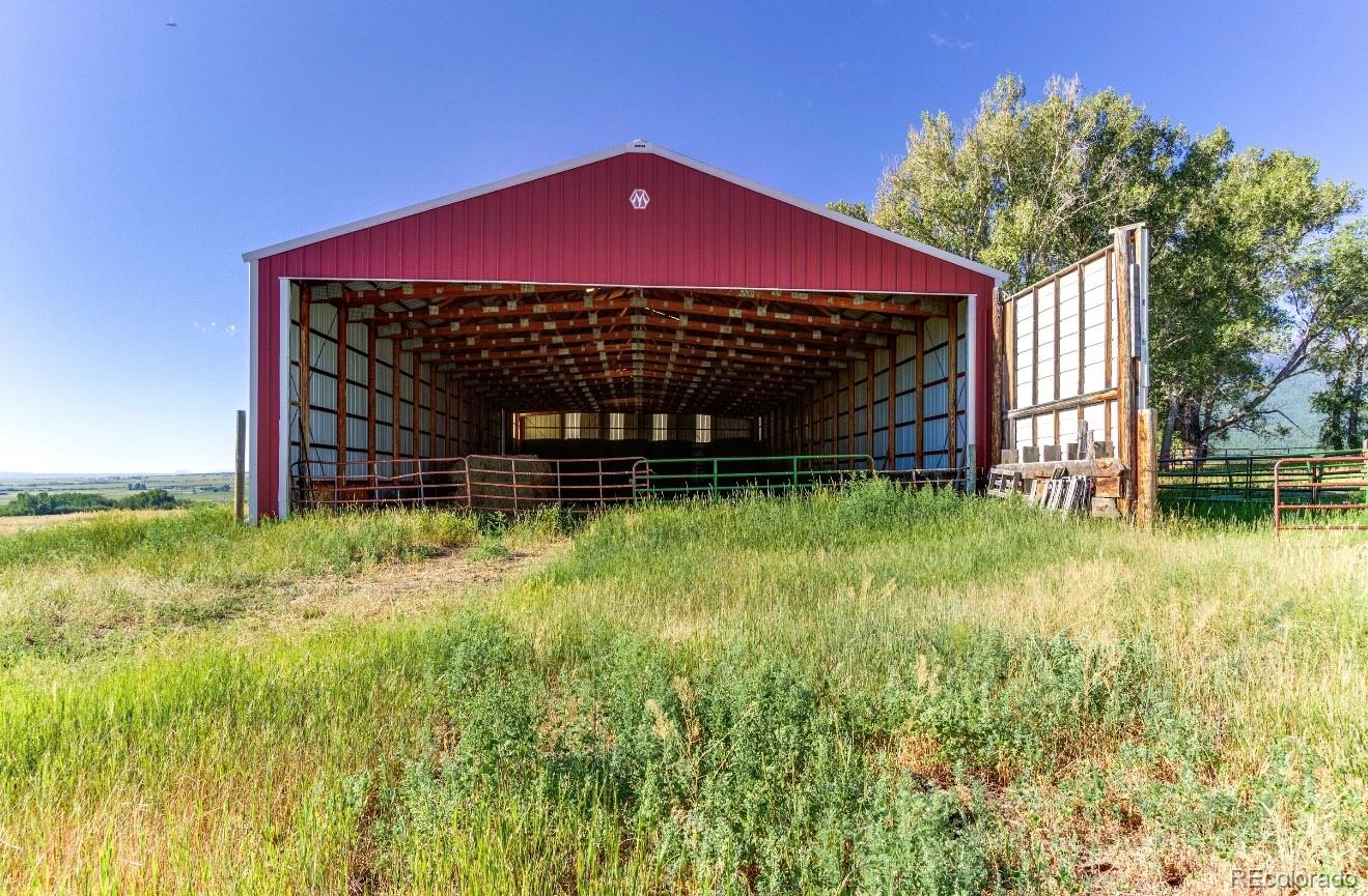 1290 Hill Country Road Westcliffe, CO 81252 - Photo 12 of 24 a front view of a house with garden