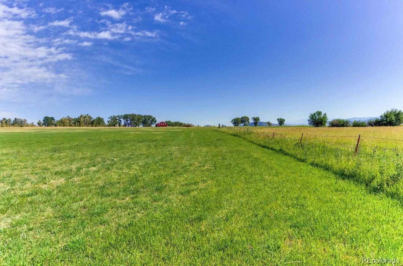 1290 Hill Country Road Westcliffe, CO 81252 - Photo 5 of 24 a view of an ocean and a yard