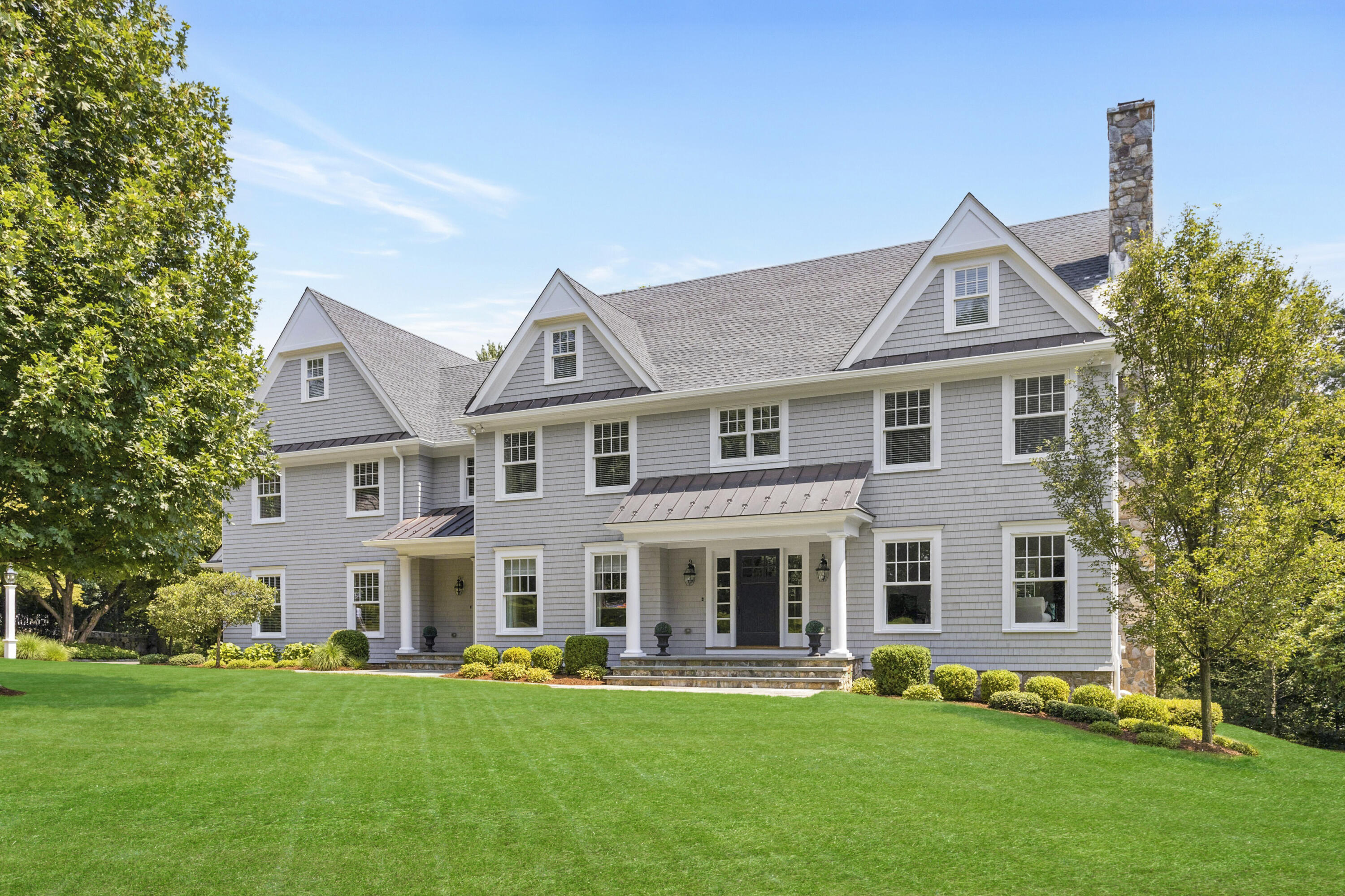46 Stanton Road Darien, CT 06820 - Photo 1 of 48 front view of a house with a yard