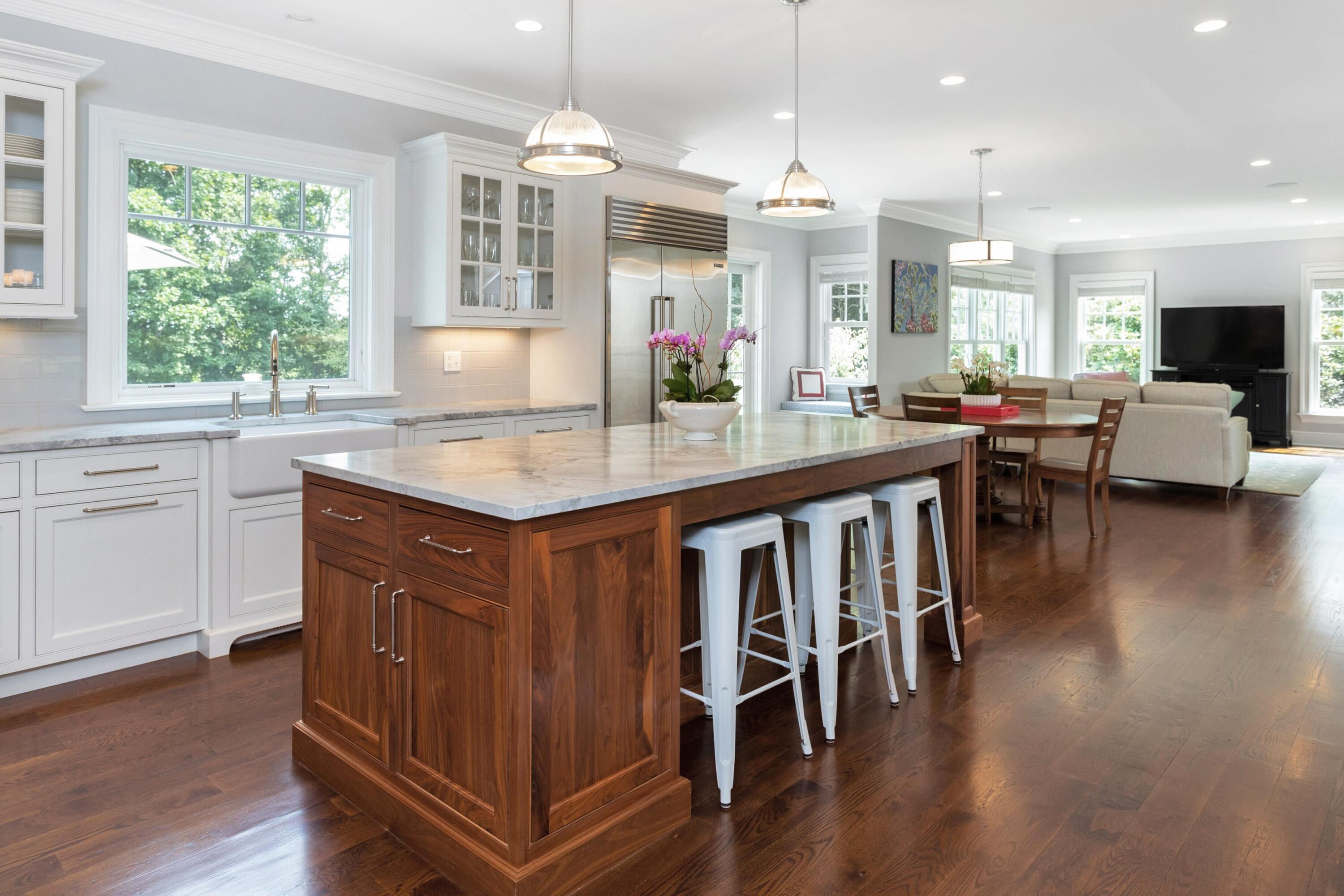 46 Stanton Road Darien, CT 06820 - Photo 14 of 48 a dining table with chairs and wooden floor