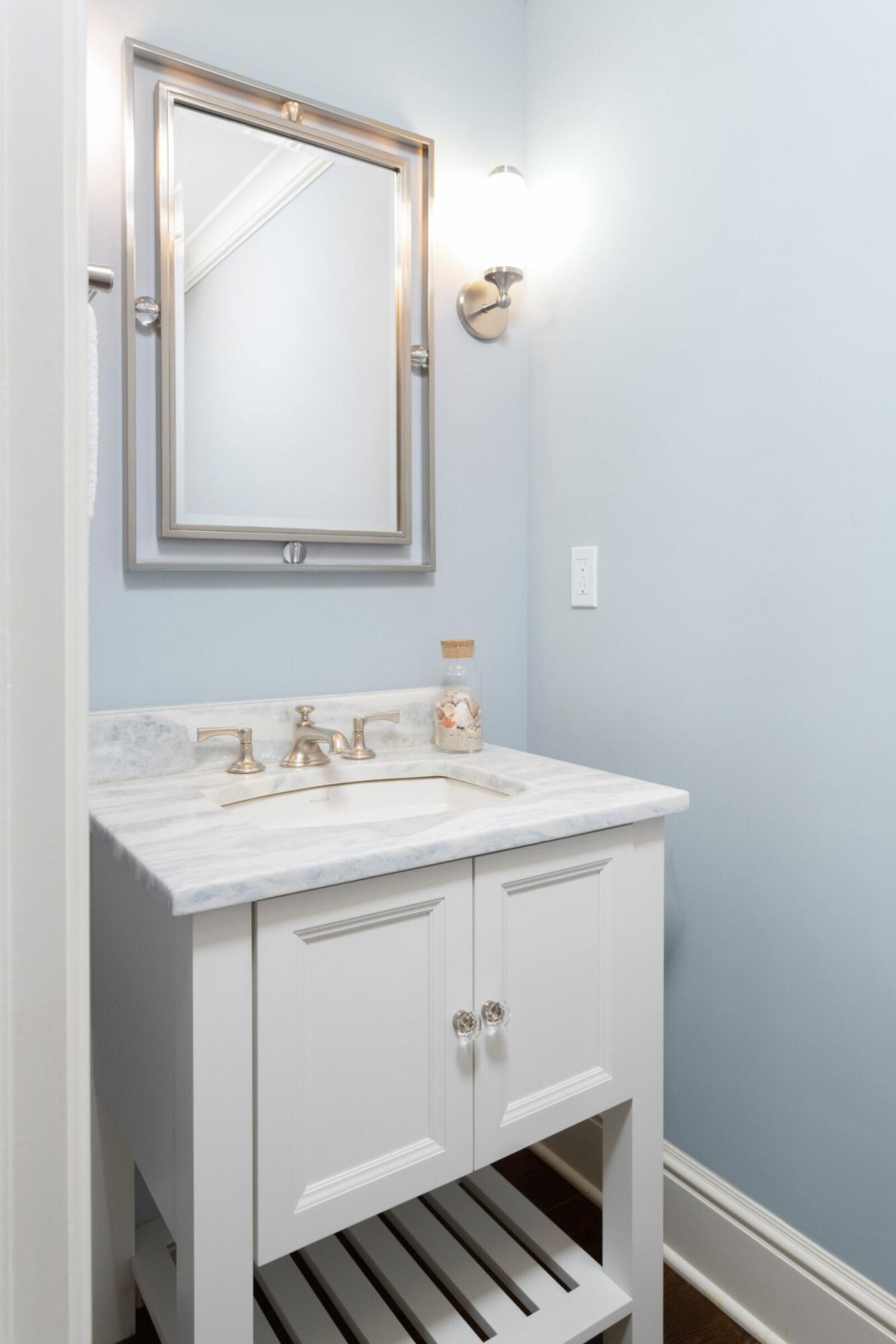 46 Stanton Road Darien, CT 06820 - Photo 20 of 48 a bathroom with a sink and a mirror