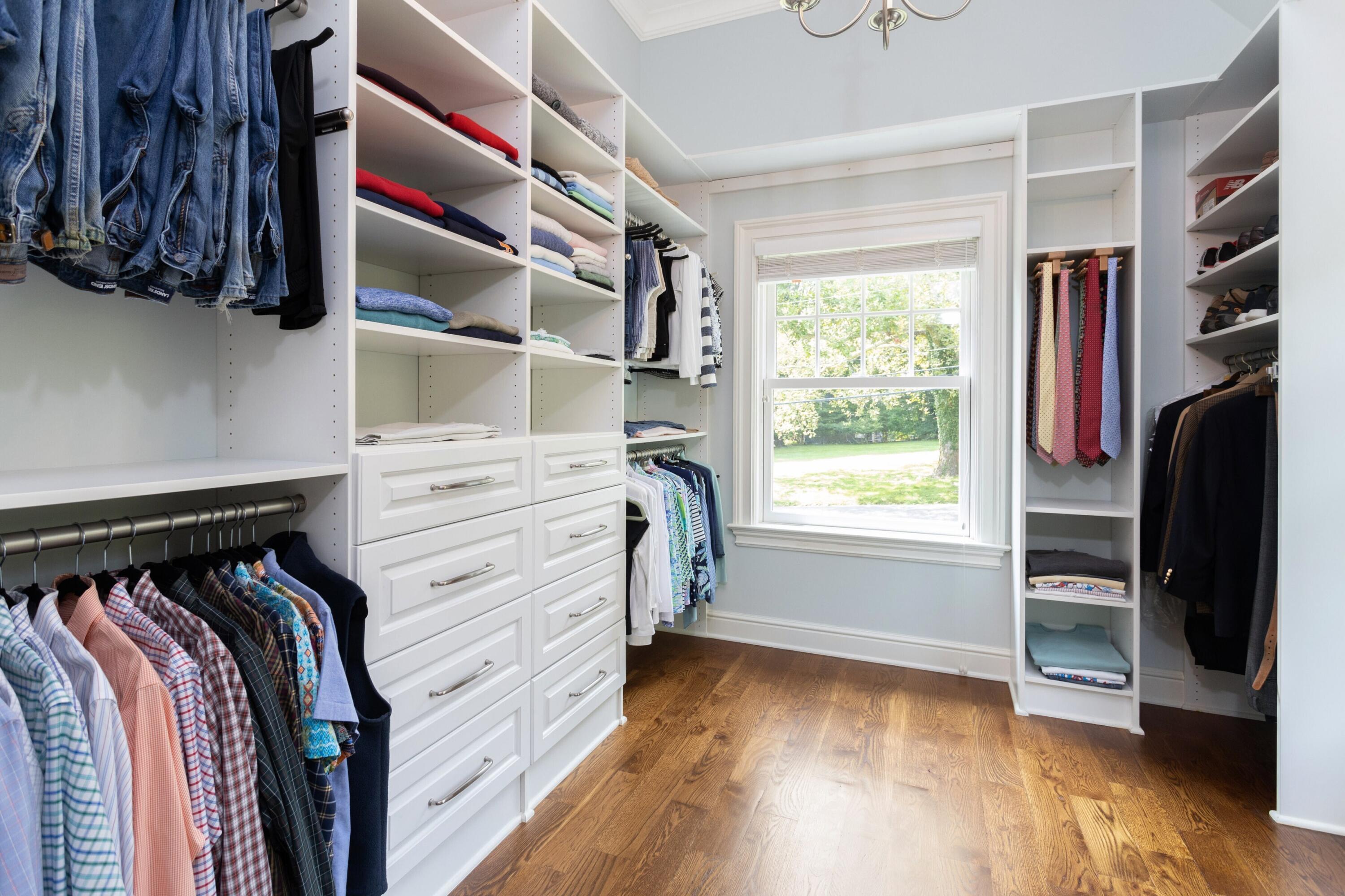 46 Stanton Road Darien, CT 06820 - Photo 25 of 48 a view of walk in closet with clothes and shoes