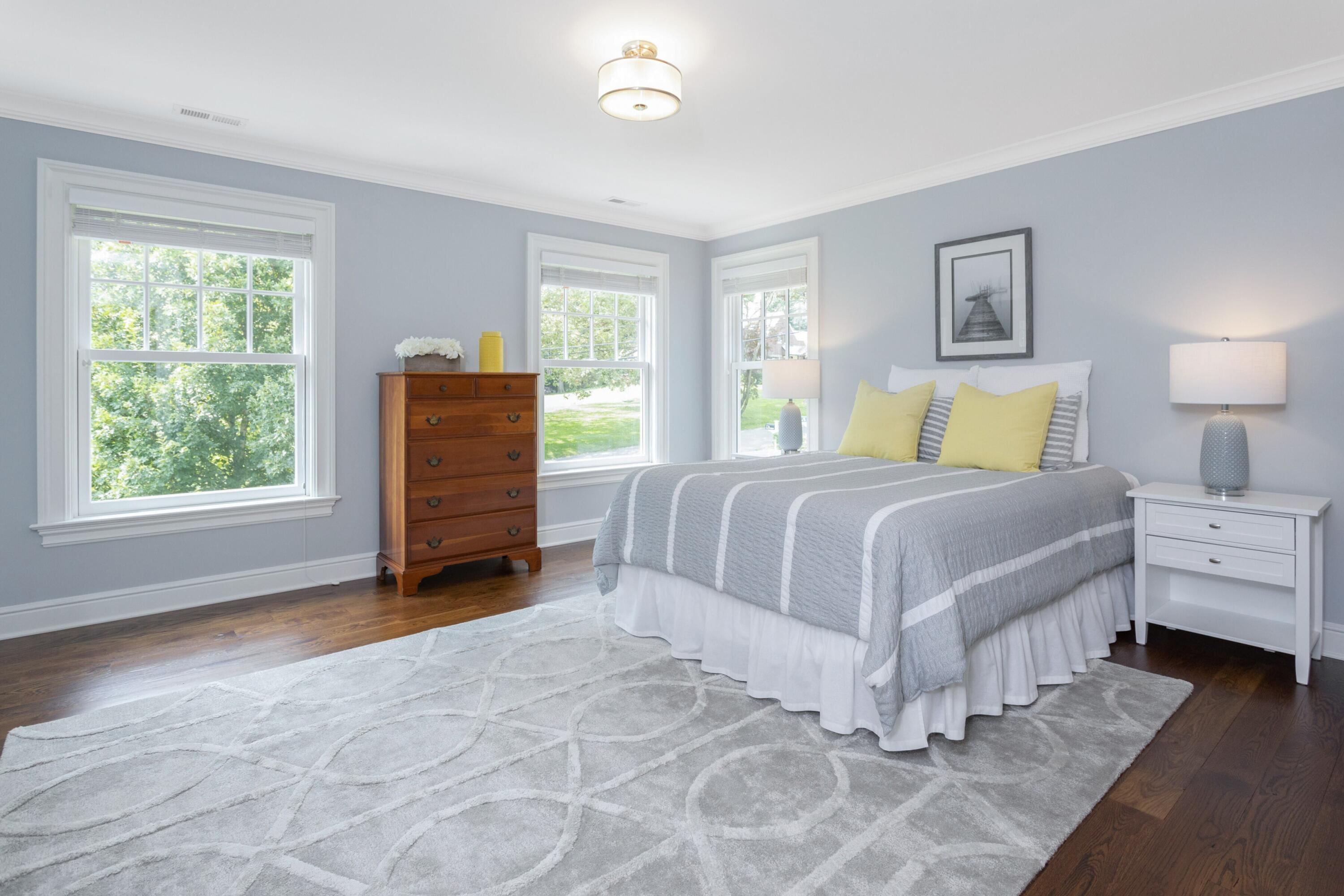 46 Stanton Road Darien, CT 06820 - Photo 26 of 48 a spacious bedroom with a bed and a window