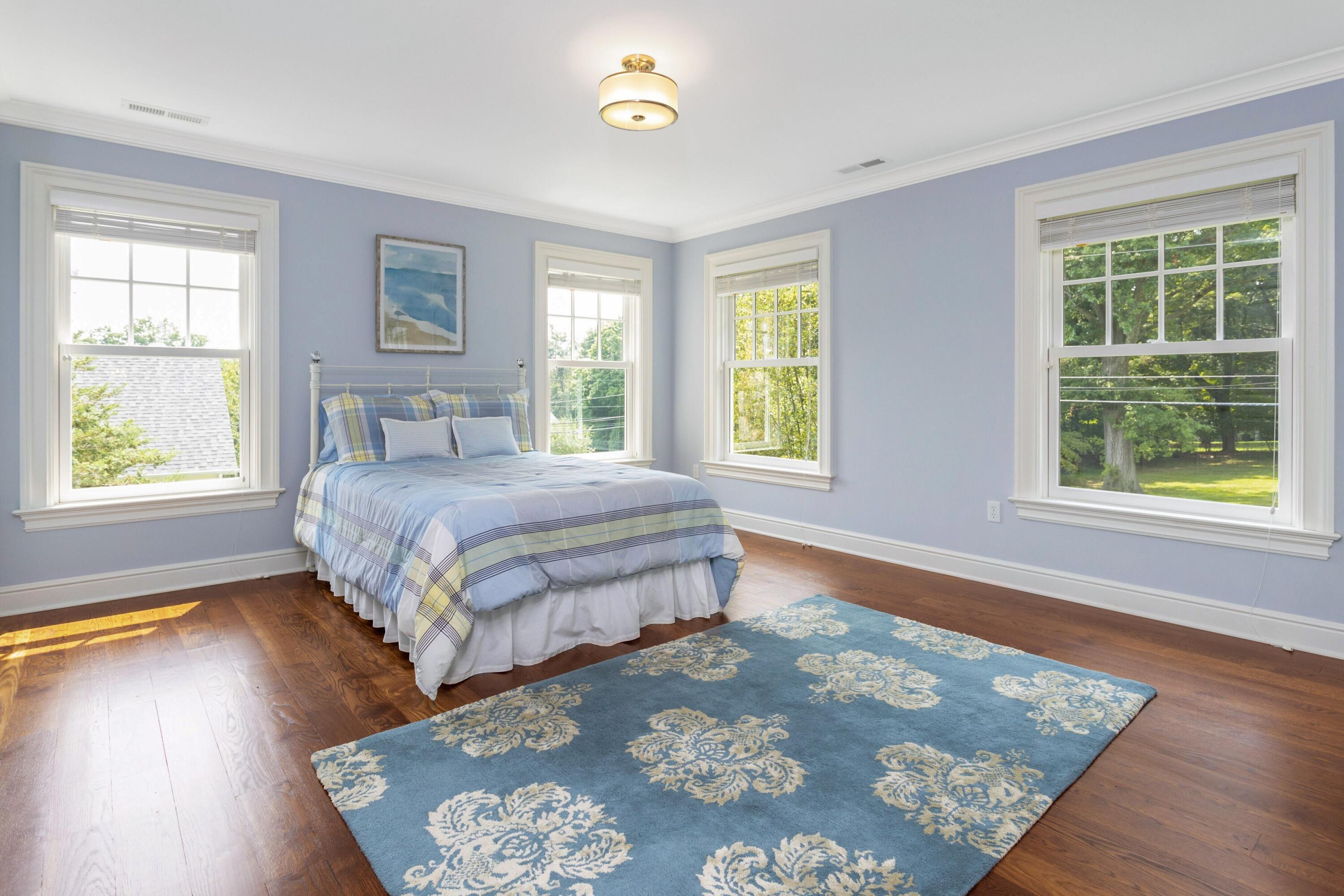 46 Stanton Road Darien, CT 06820 - Photo 28 of 48 a bedroom with a bed and a window