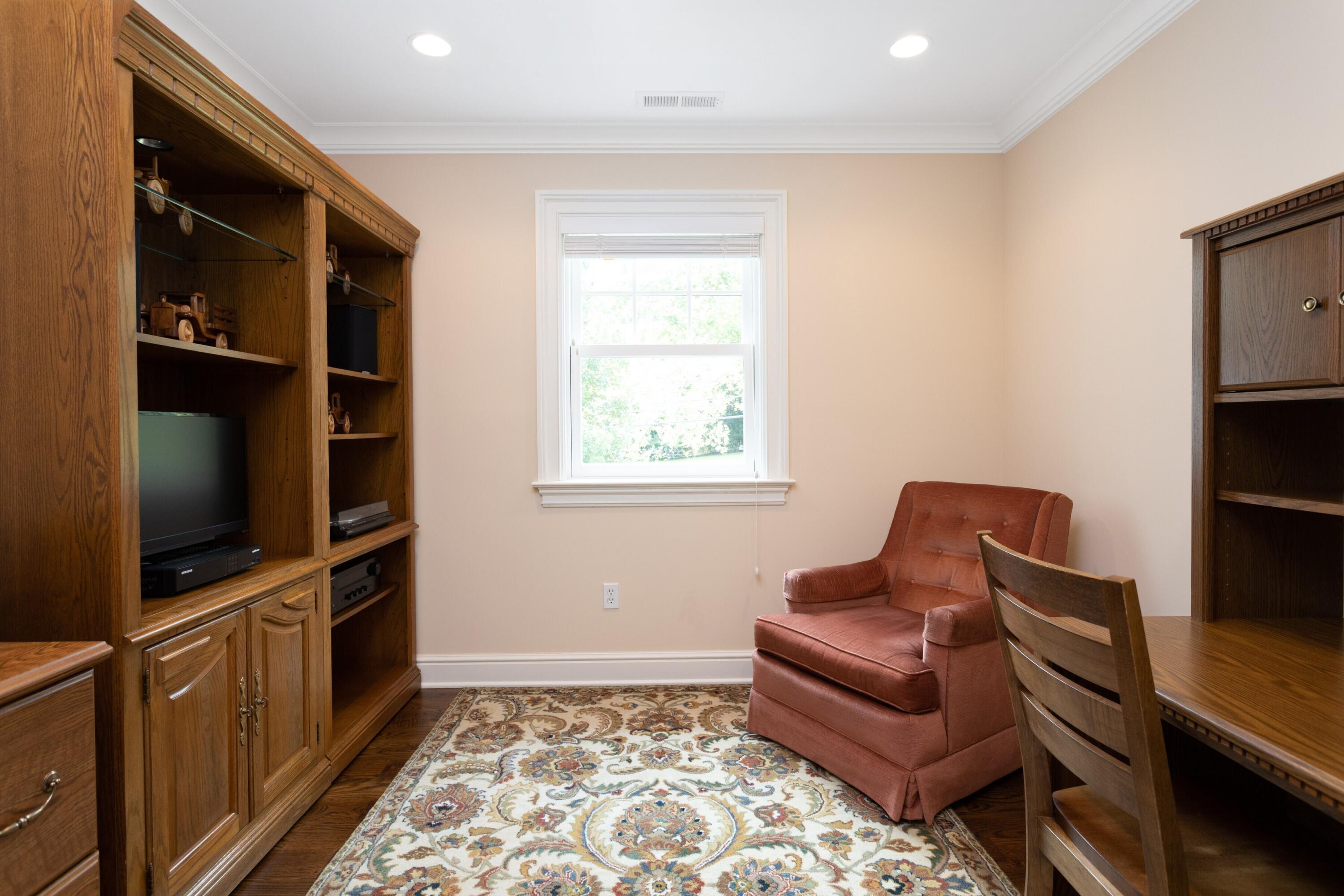 46 Stanton Road Darien, CT 06820 - Photo 34 of 48 a living room with furniture and a flat screen tv
