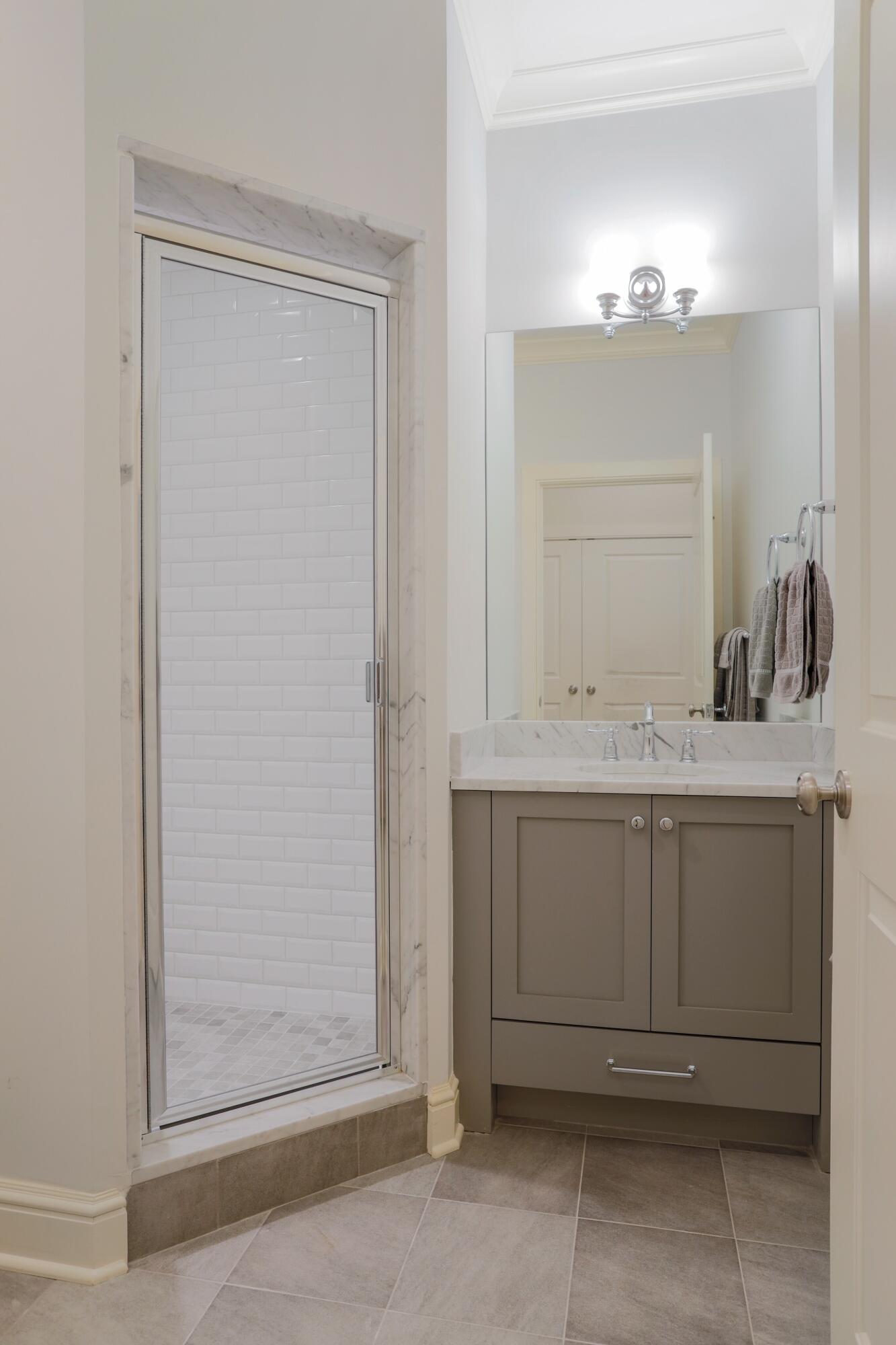46 Stanton Road Darien, CT 06820 - Photo 38 of 48 a bathroom with a sink and a mirror