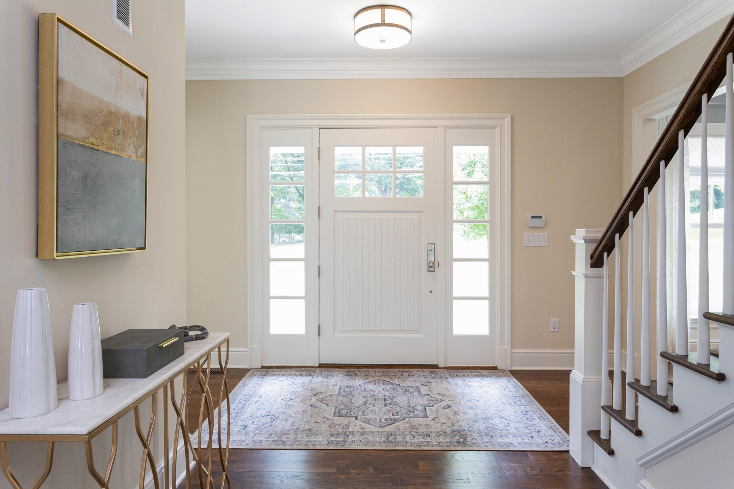 46 Stanton Road Darien, CT 06820 - Photo 4 of 48 a view of an entryway with wooden floor and door