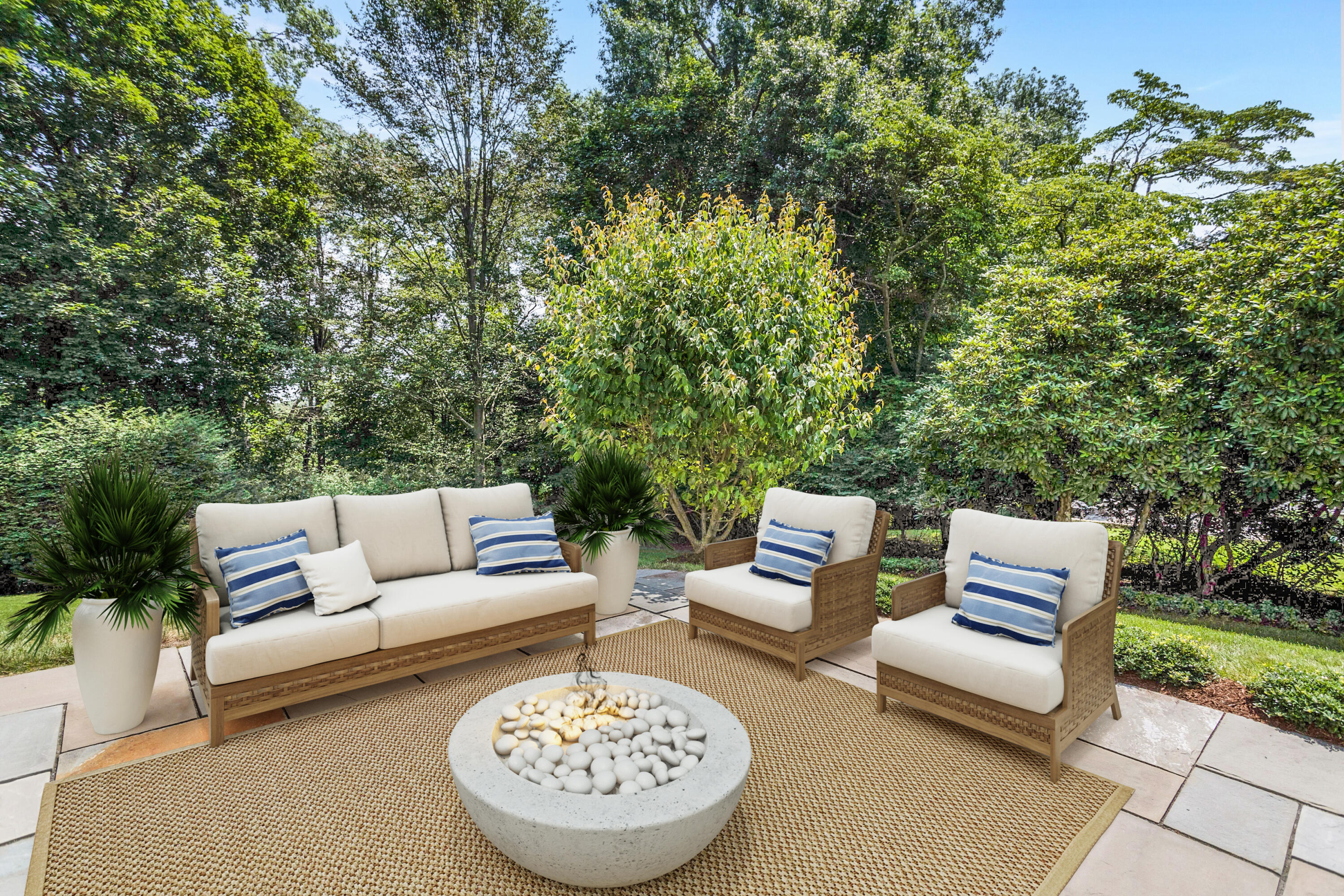 46 Stanton Road Darien, CT 06820 - Photo 41 of 48 a view of a patio with couches and a table and chairs with garden view
