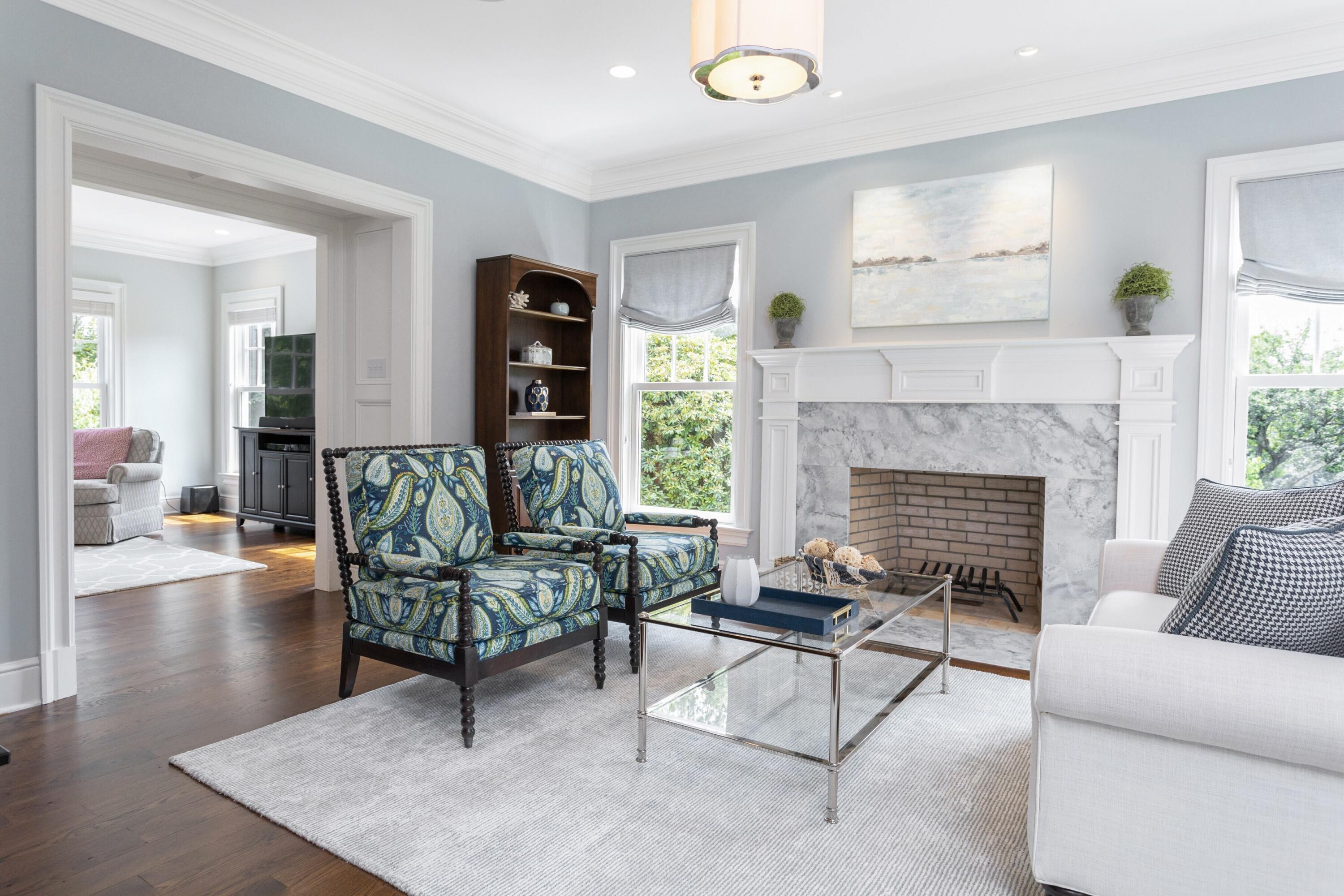 46 Stanton Road Darien, CT 06820 - Photo 6 of 48 a living room with furniture and a fireplace