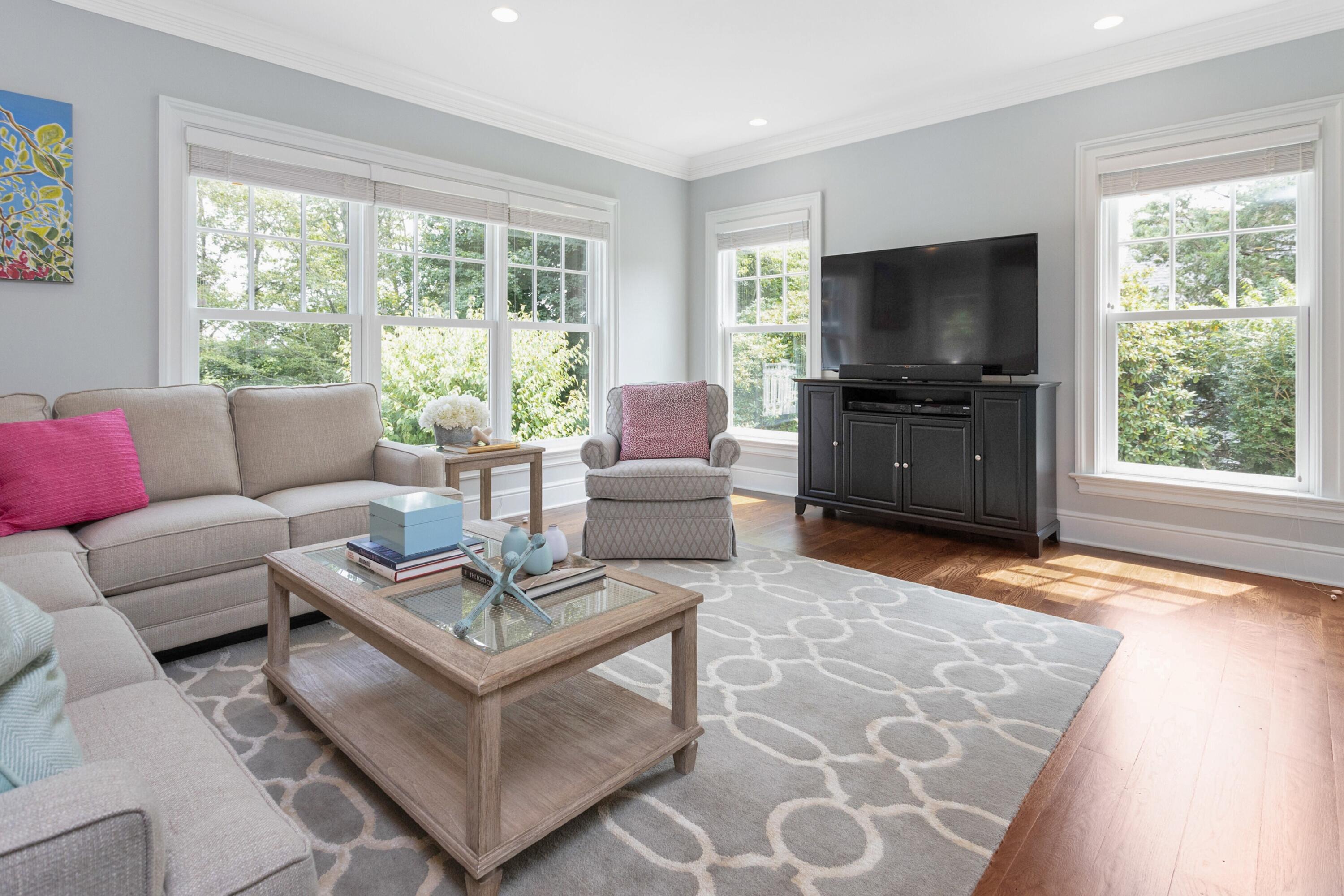 46 Stanton Road Darien, CT 06820 - Photo 10 of 48 a living room with furniture and a flat screen tv