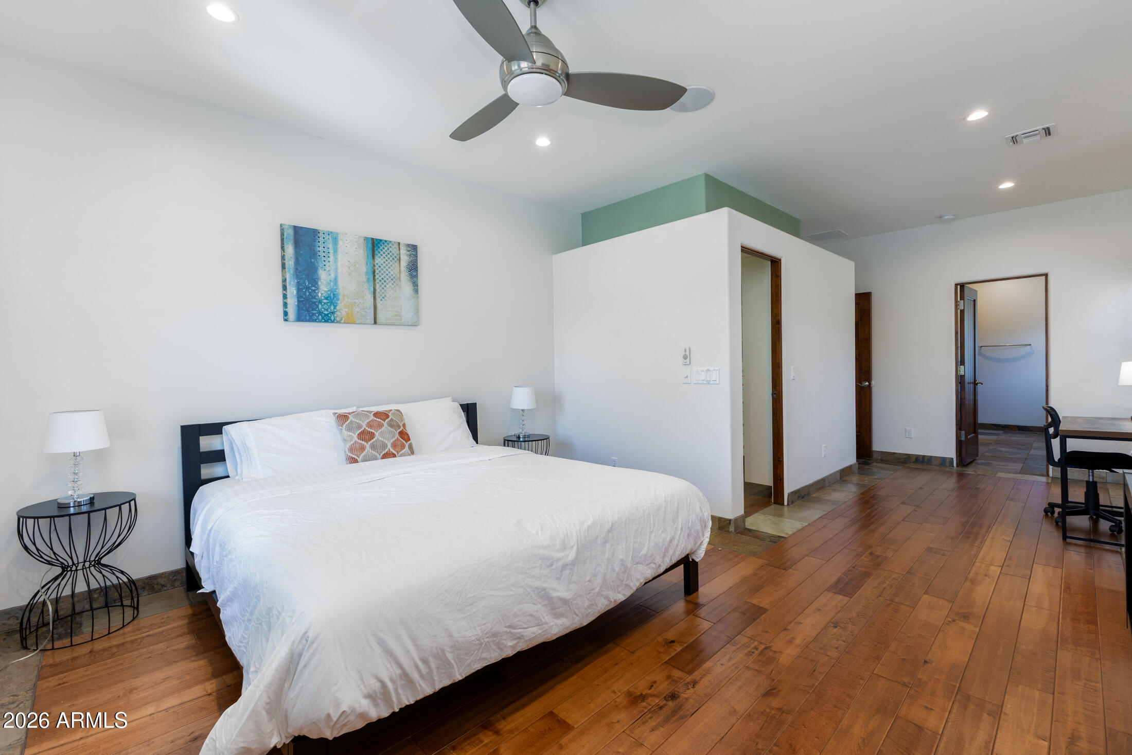 2517 North 8th Street Phoenix, AZ 85006 - Photo 24 of 48 a bedroom with a bed and a table