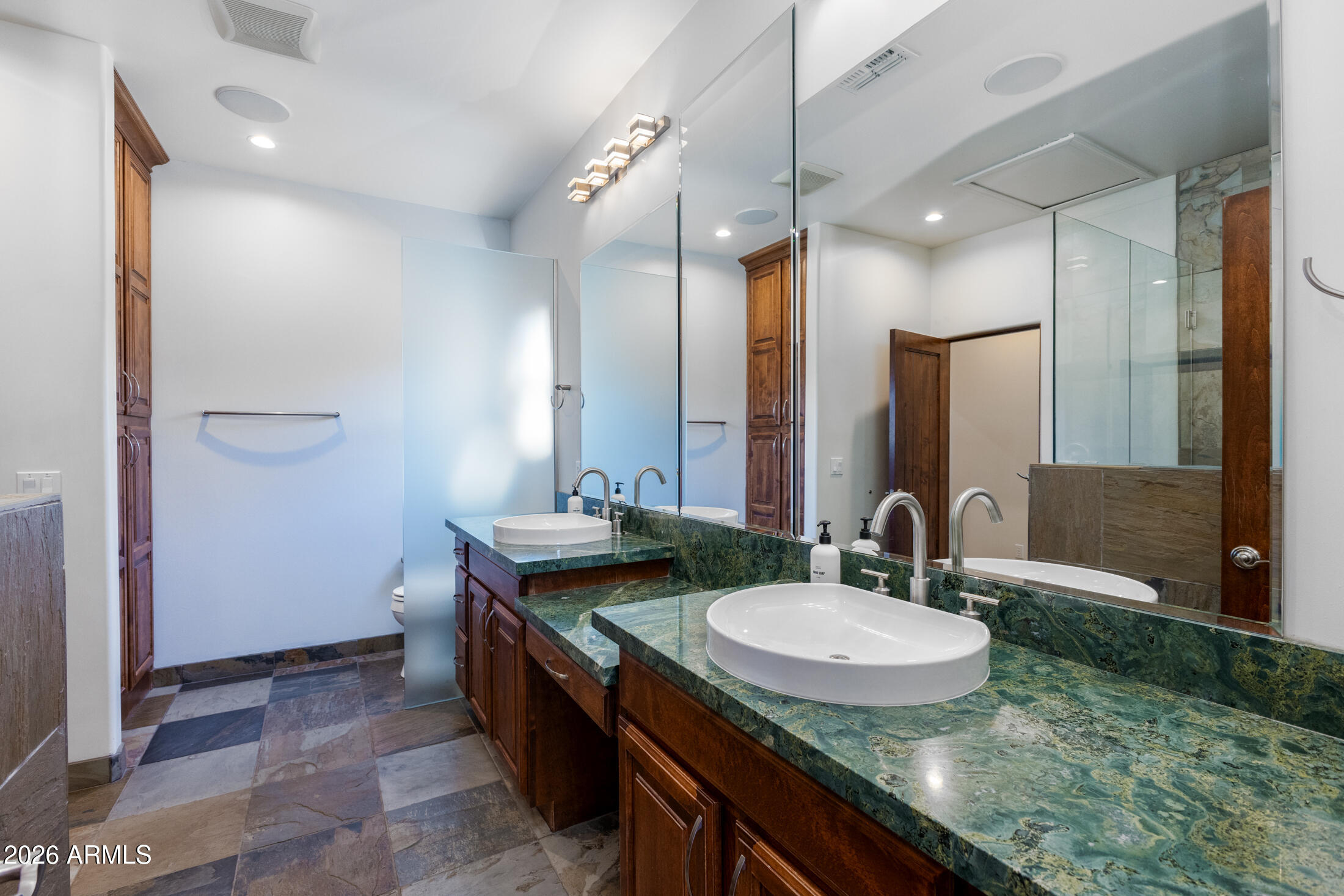 2517 North 8th Street Phoenix, AZ 85006 - Photo 26 of 48 a bathroom with a sink double vanity granite and a mirror