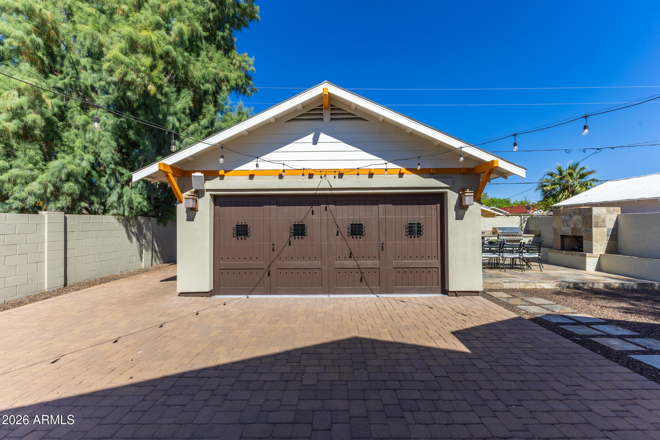 2517 North 8th Street Phoenix, AZ 85006 - Photo 35 of 48 a front view of a house with a yard and garage