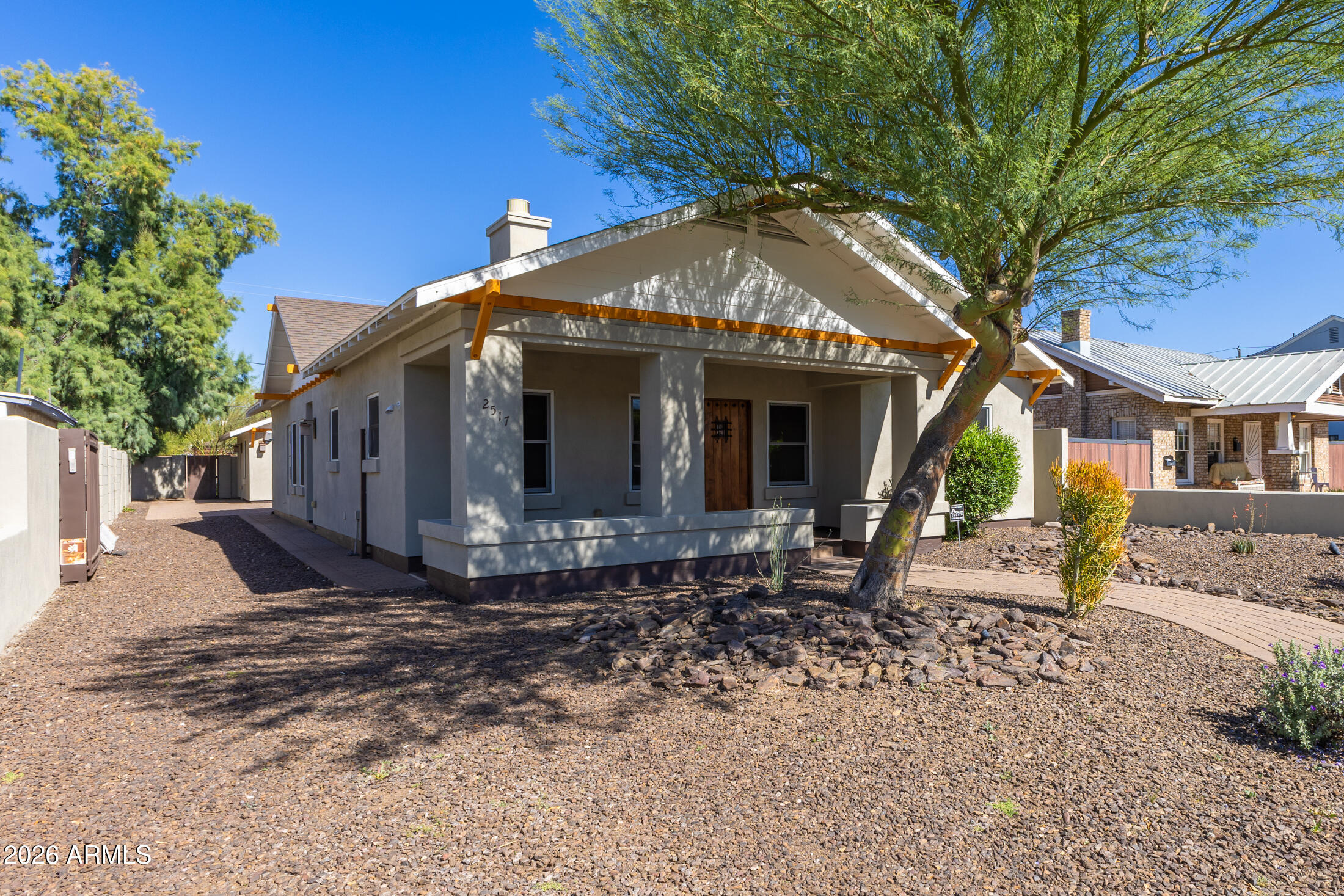 2517 North 8th Street Phoenix, AZ 85006 - Photo 37 of 48 a front view of a house with a yard