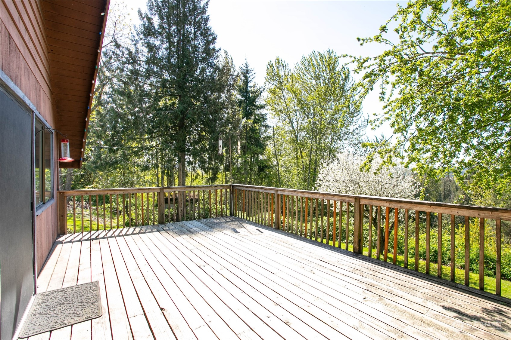 6402 Goodwin Road Everson, WA 98247 - Photo 14 of 39 a balcony with trees in front of it
