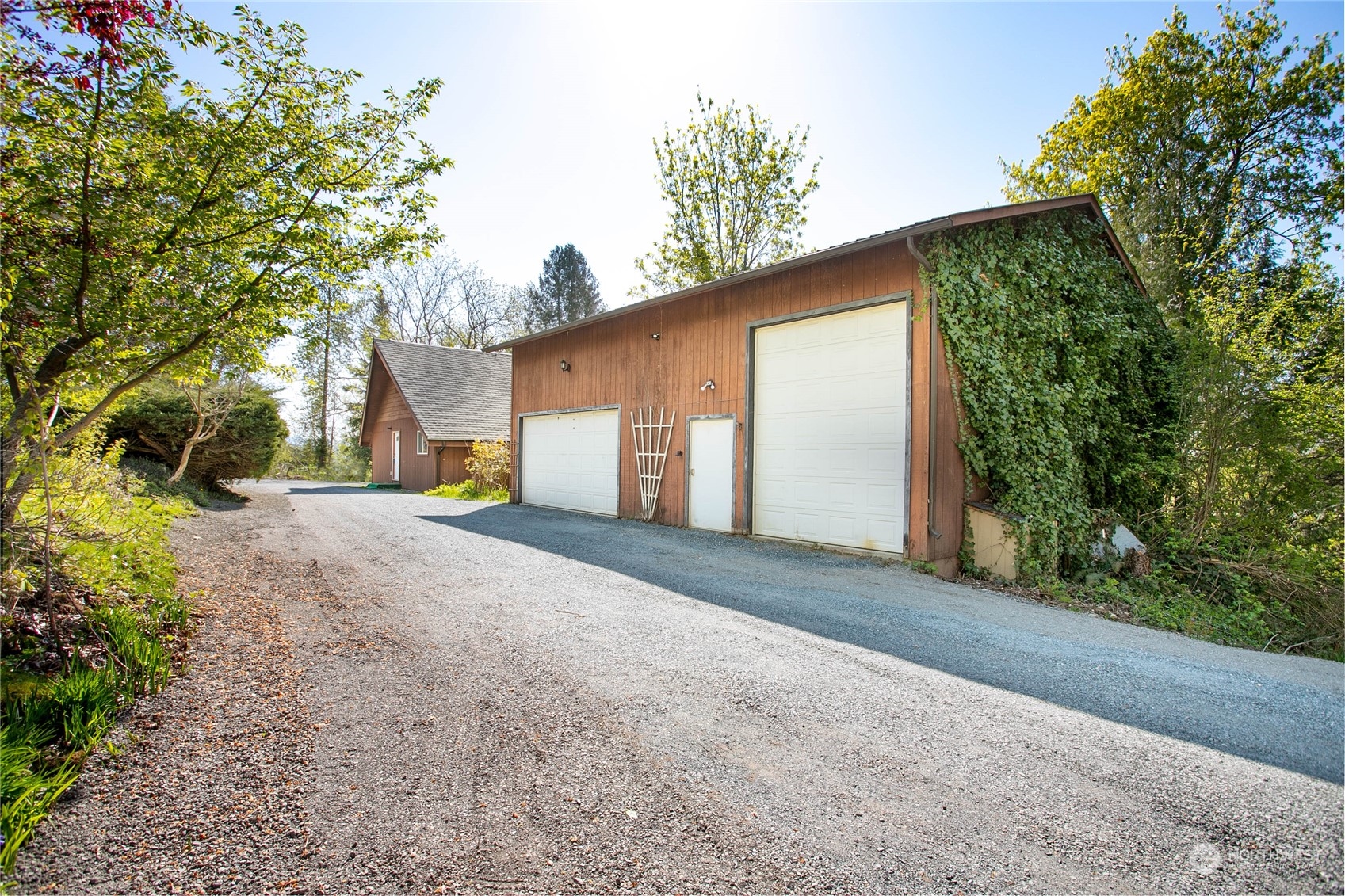 6402 Goodwin Road Everson, WA 98247 - Photo 29 of 39 a view of a house with a yard and garage