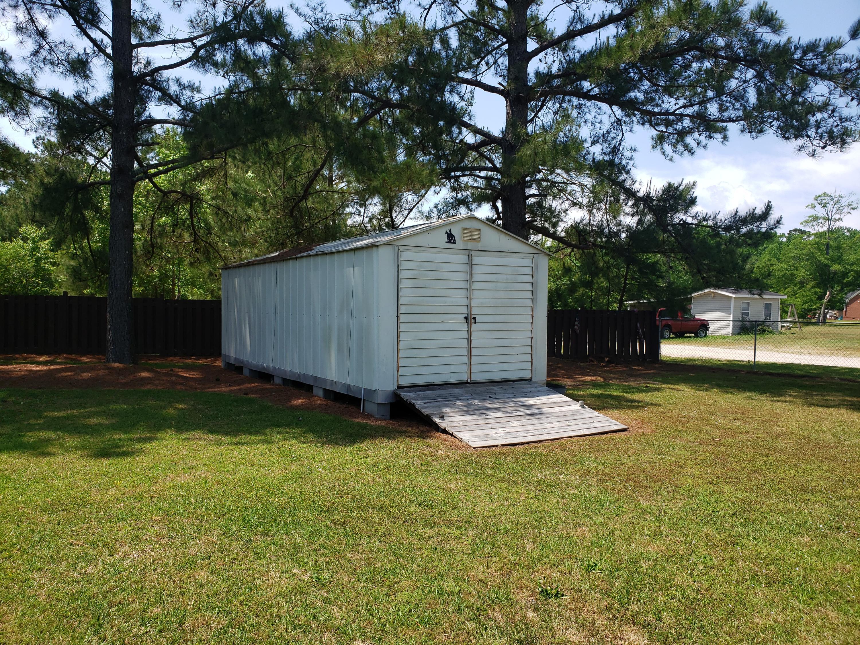 2459 Stout Road Northwest Ash, NC 28420 - Photo 17 of 19 Storage shed has electric.