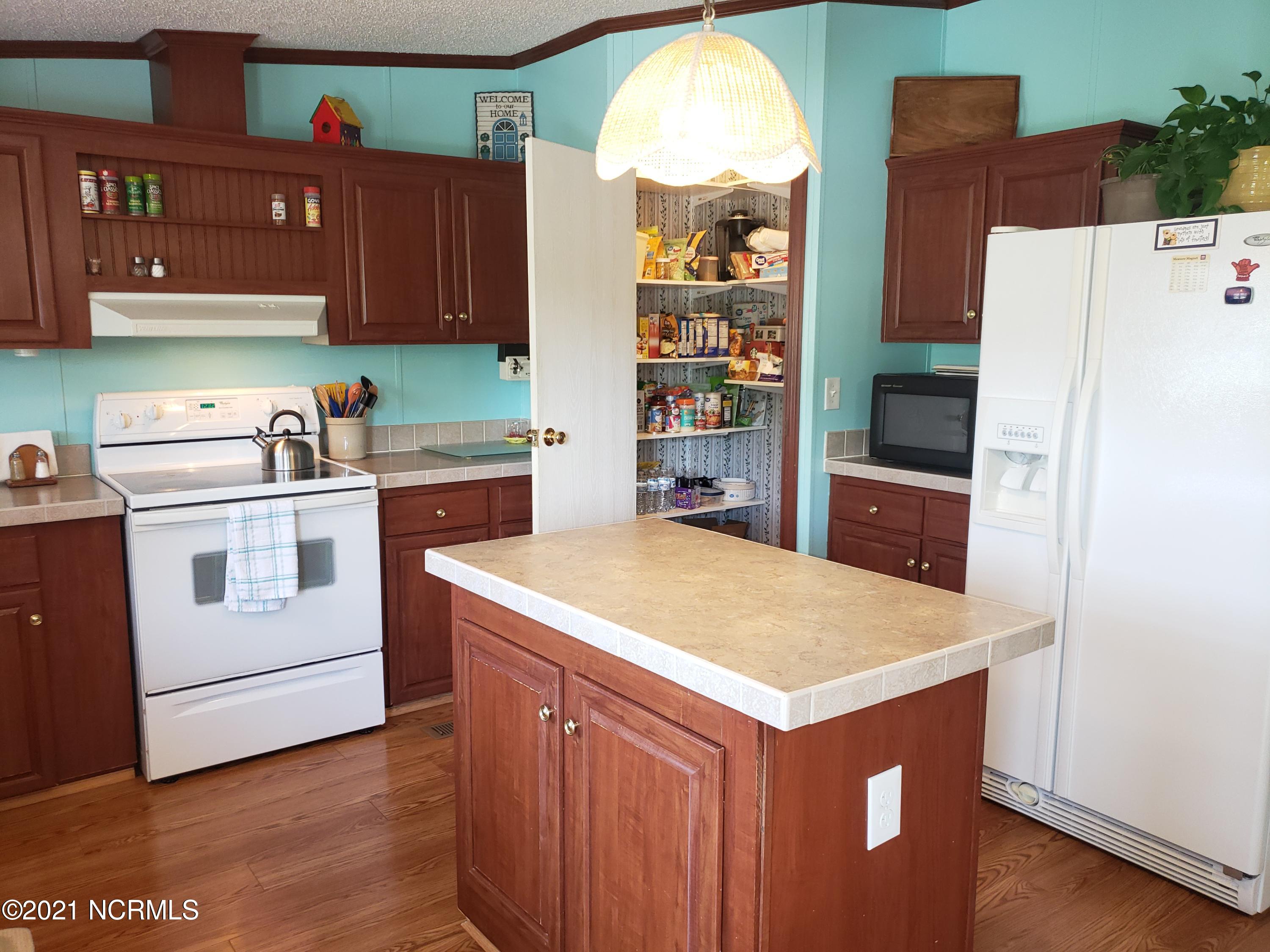 2459 Stout Road Northwest Ash, NC 28420 - Photo 5 of 19 Island in the kitchen for extra work space!