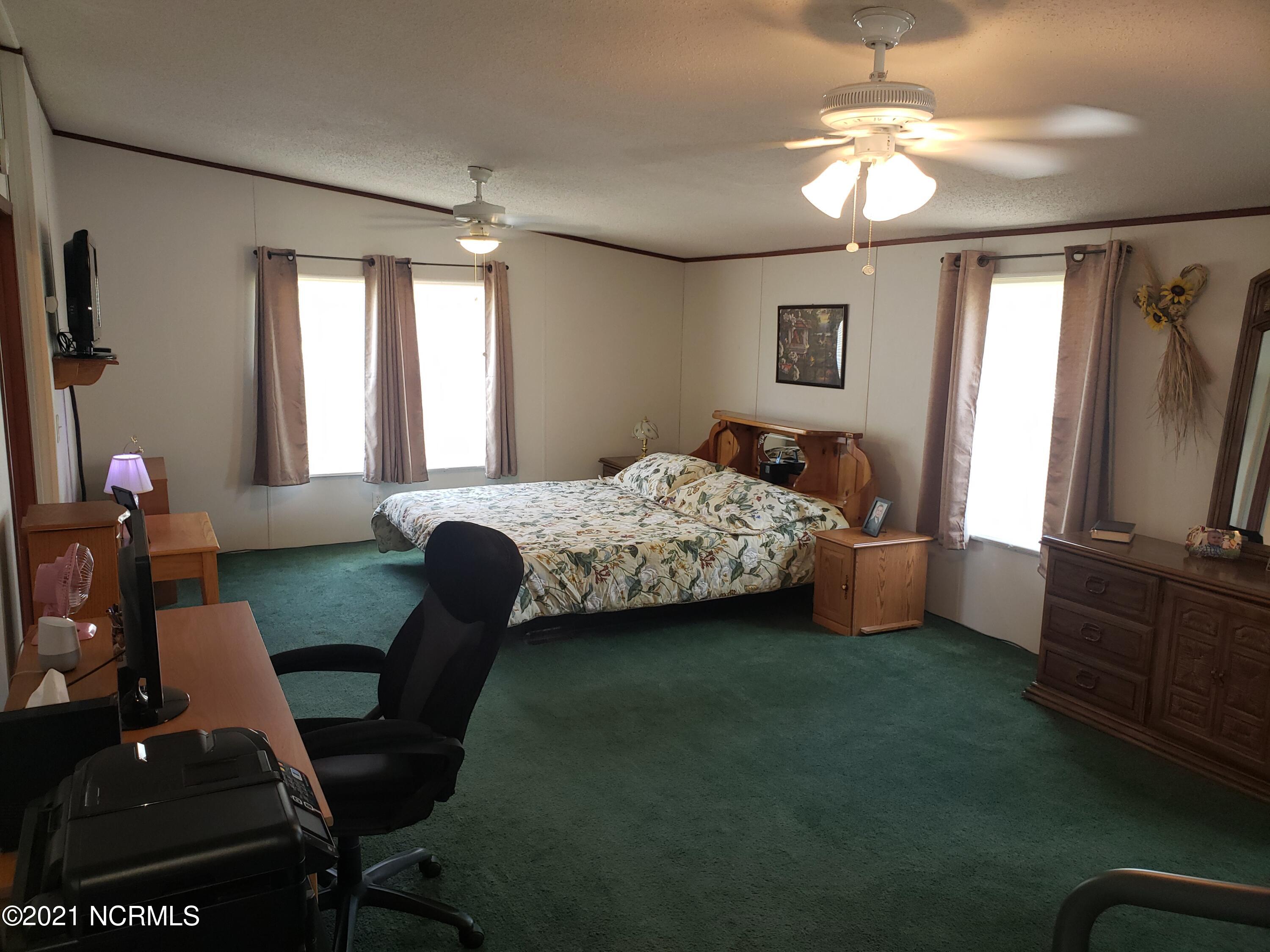 2459 Stout Road Northwest Ash, NC 28420 - Photo 6 of 19 Owners bedroom is huge!