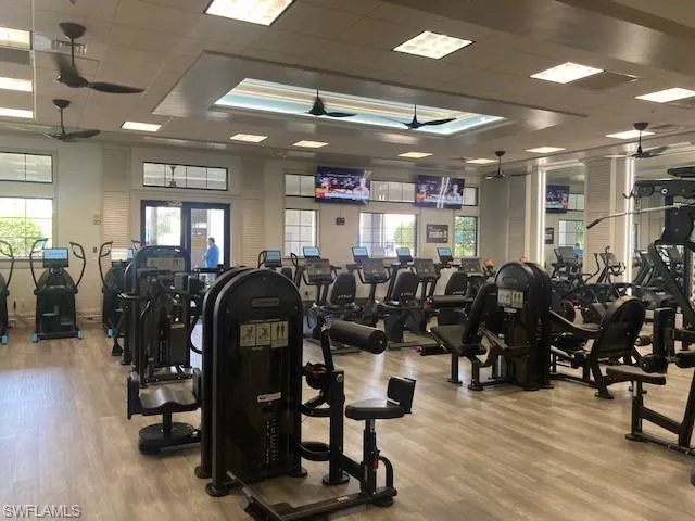 a large room with lots of wooden furniture