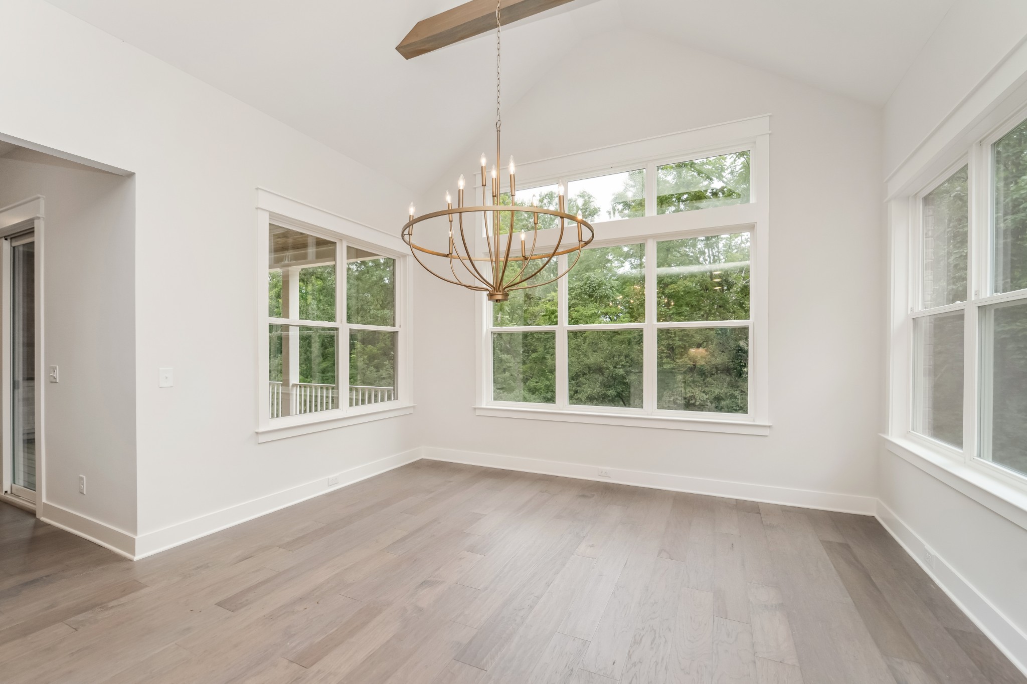349 Bournemouth Lane Hermitage, TN 37076 - Photo 22 of 60 an empty room with wooden floor and windows