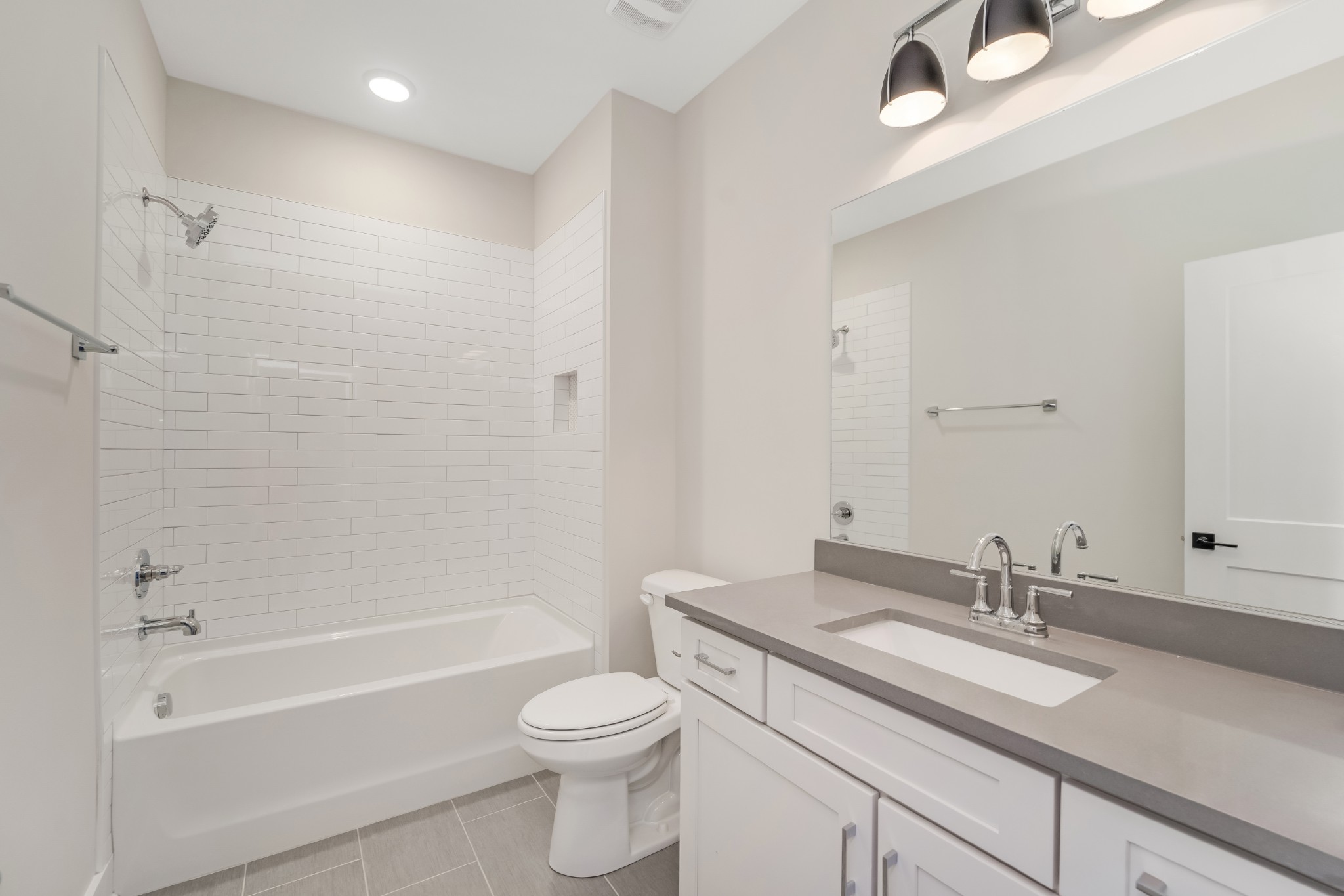 349 Bournemouth Lane Hermitage, TN 37076 - Photo 40 of 60 a bathroom with a granite countertop sink a toilet and shower