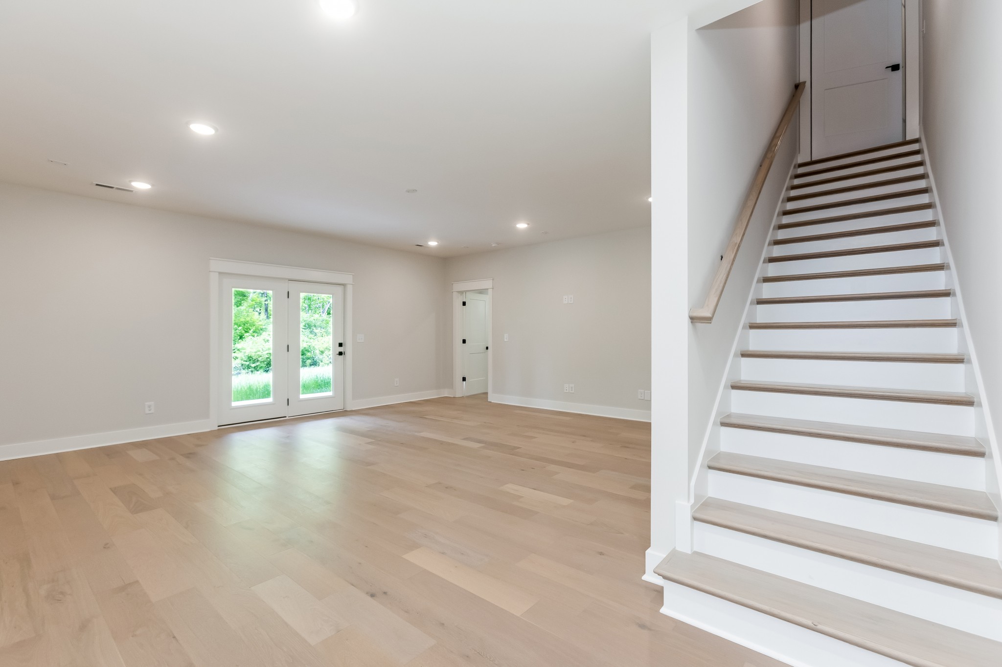 349 Bournemouth Lane Hermitage, TN 37076 - Photo 53 of 60 a view of an empty room with wooden floor and windows