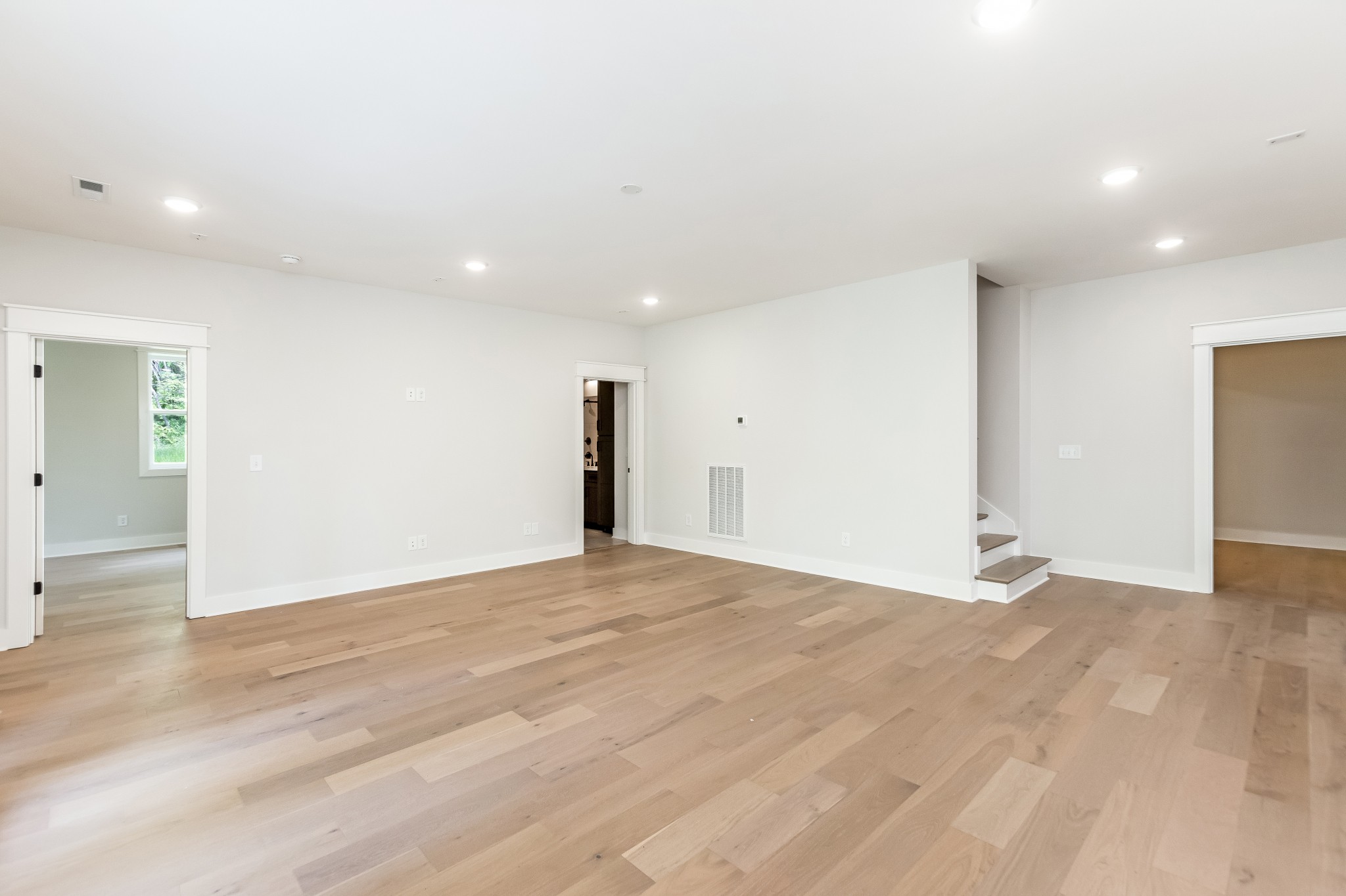 349 Bournemouth Lane Hermitage, TN 37076 - Photo 54 of 60 a view of an empty room with wooden floor