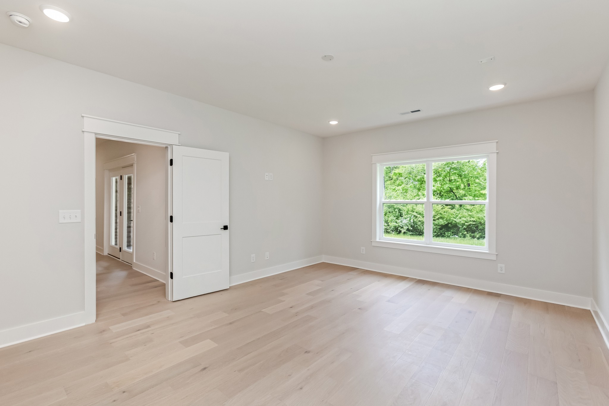 349 Bournemouth Lane Hermitage, TN 37076 - Photo 55 of 60 an empty room with wooden floor and window