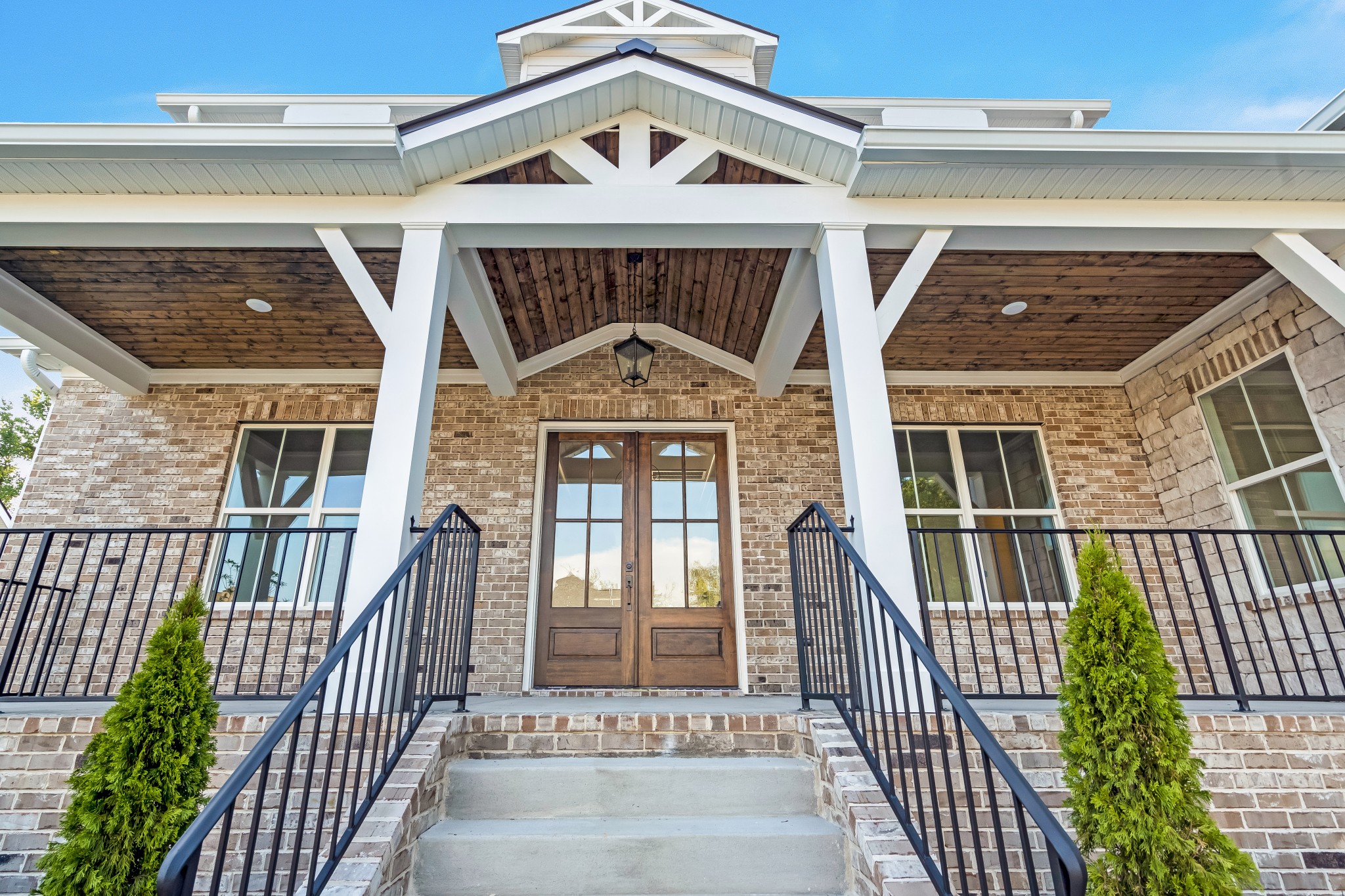 349 Bournemouth Lane Hermitage, TN 37076 - Photo 6 of 60 a view of a brick house with large windows