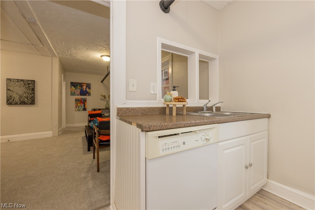 2116 Surrey Road, Unit 5 Cleveland, OH 44106 - Photo 13 of 19 The Eat-In Kitchen offers a view of the Living Room