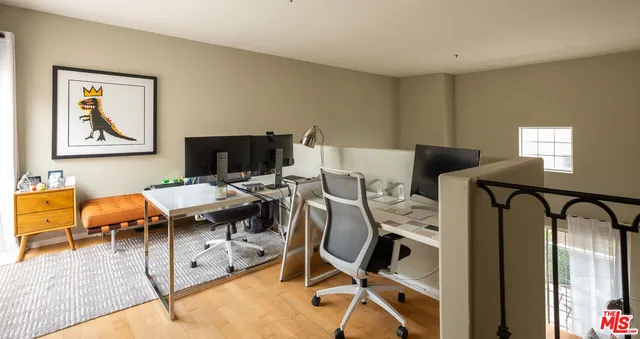 a view of a livingroom with furniture and a couch