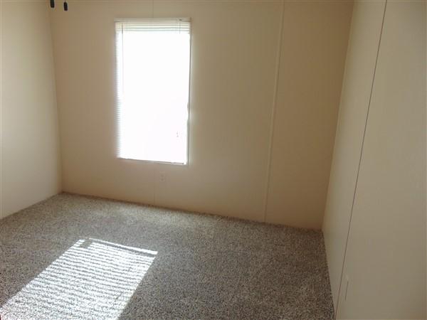 1051 Hinote Road DeFuniak Springs, FL 32433 - Photo 11 of 39 an empty room with a window