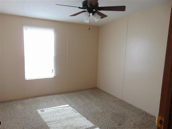 1051 Hinote Road DeFuniak Springs, FL 32433 - Photo 12 of 39 an empty room with a window