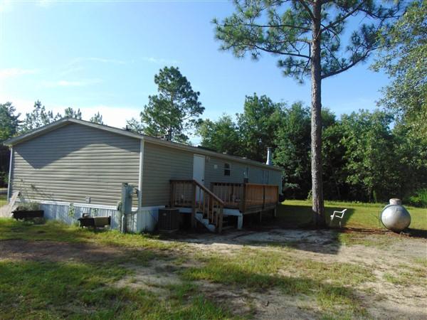 1051 Hinote Road DeFuniak Springs, FL 32433 - Photo 23 of 39 a view of outdoor space yard and patio